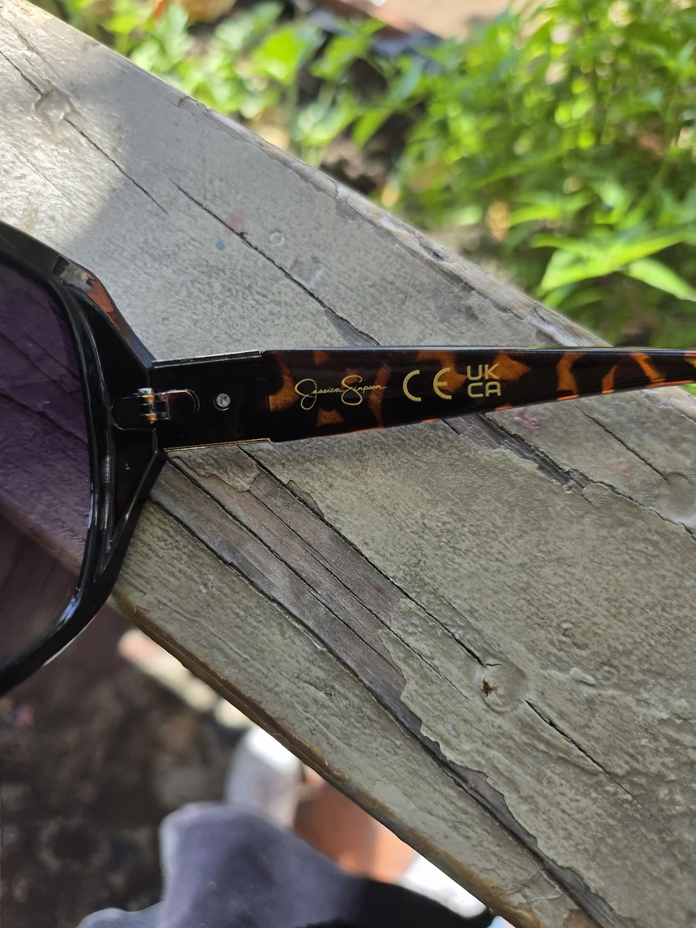 Jessica Simpson Black Frame Sunglasses with Gradient Purple Lenses